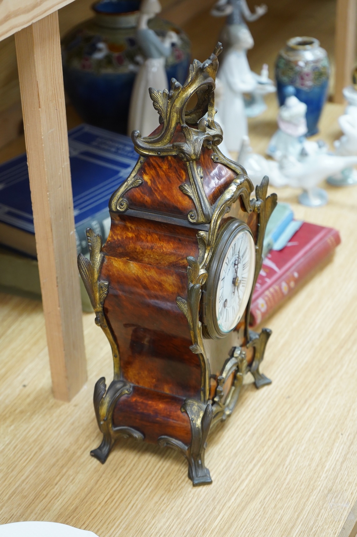 A Louis XV style tortoiseshell and ormolu-mounted mantel clock with pendulum and key, the dial inscribed Hamilton & Inches, Paris, 41cm high
